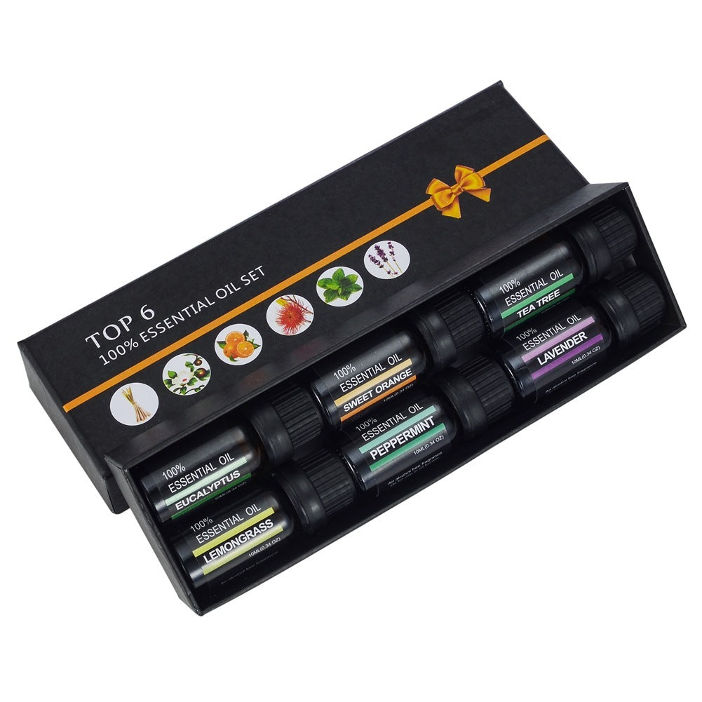 Top 6 essential oil set in a black box with visible labels on a white background