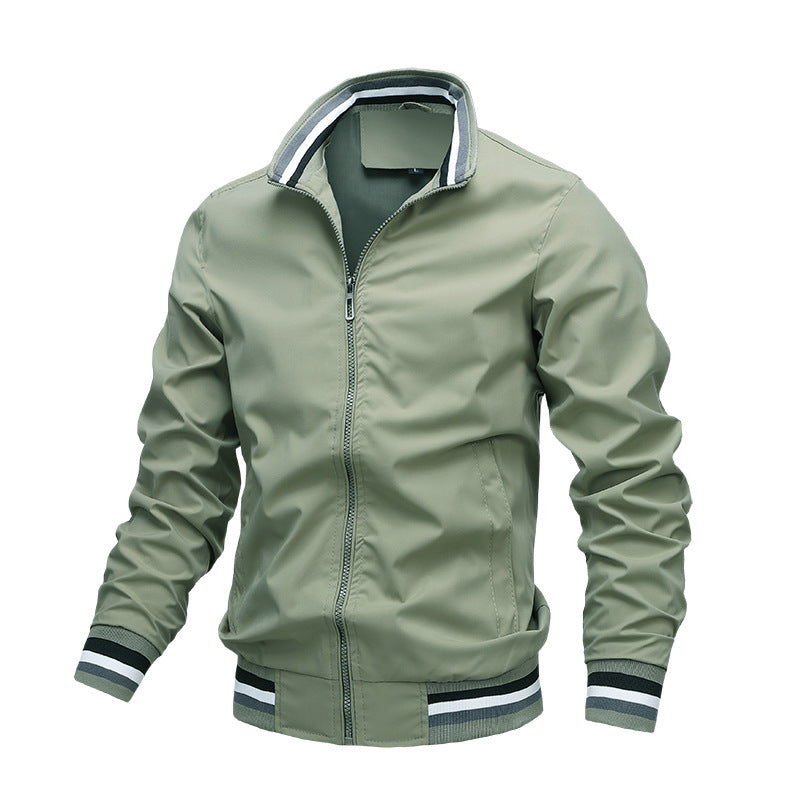Green jacket with black and white trim on a white background