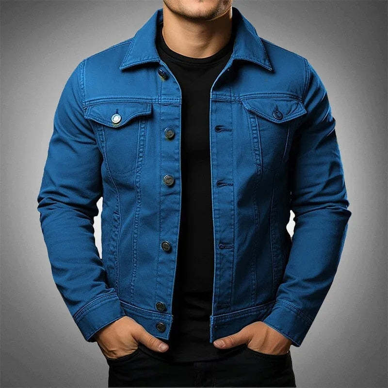 Blue denim jacket worn by a person on a gray background