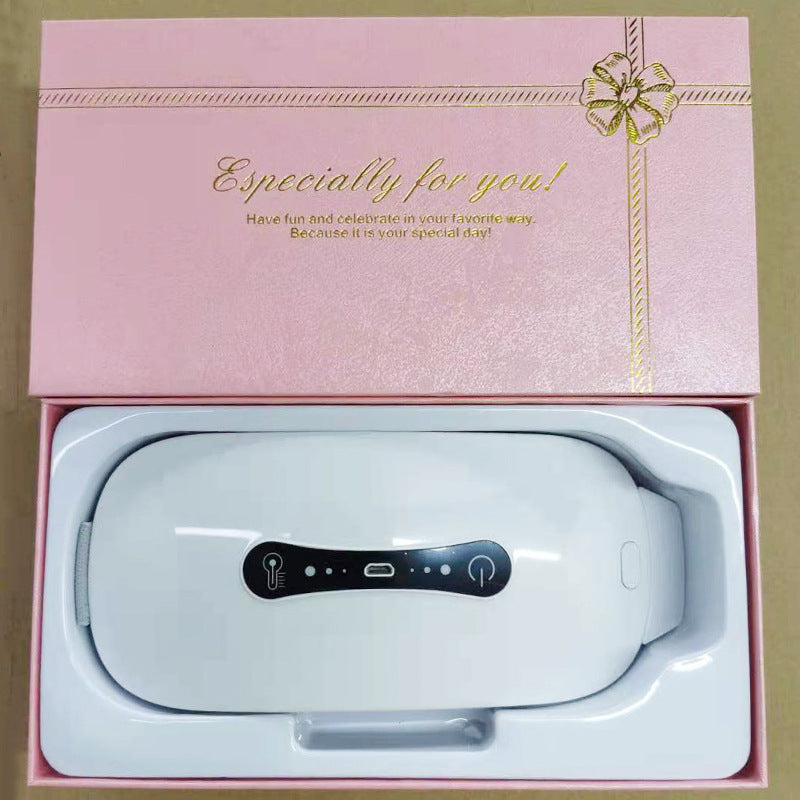 White electronic device in a pink gift box with a gold bow and text.