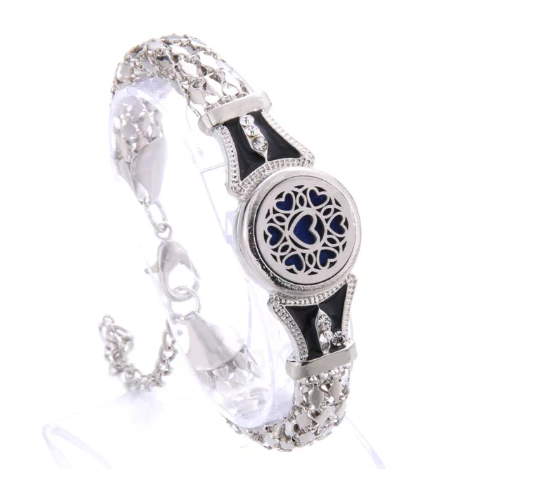 Decorative bracelet with blue heart design on a white background
