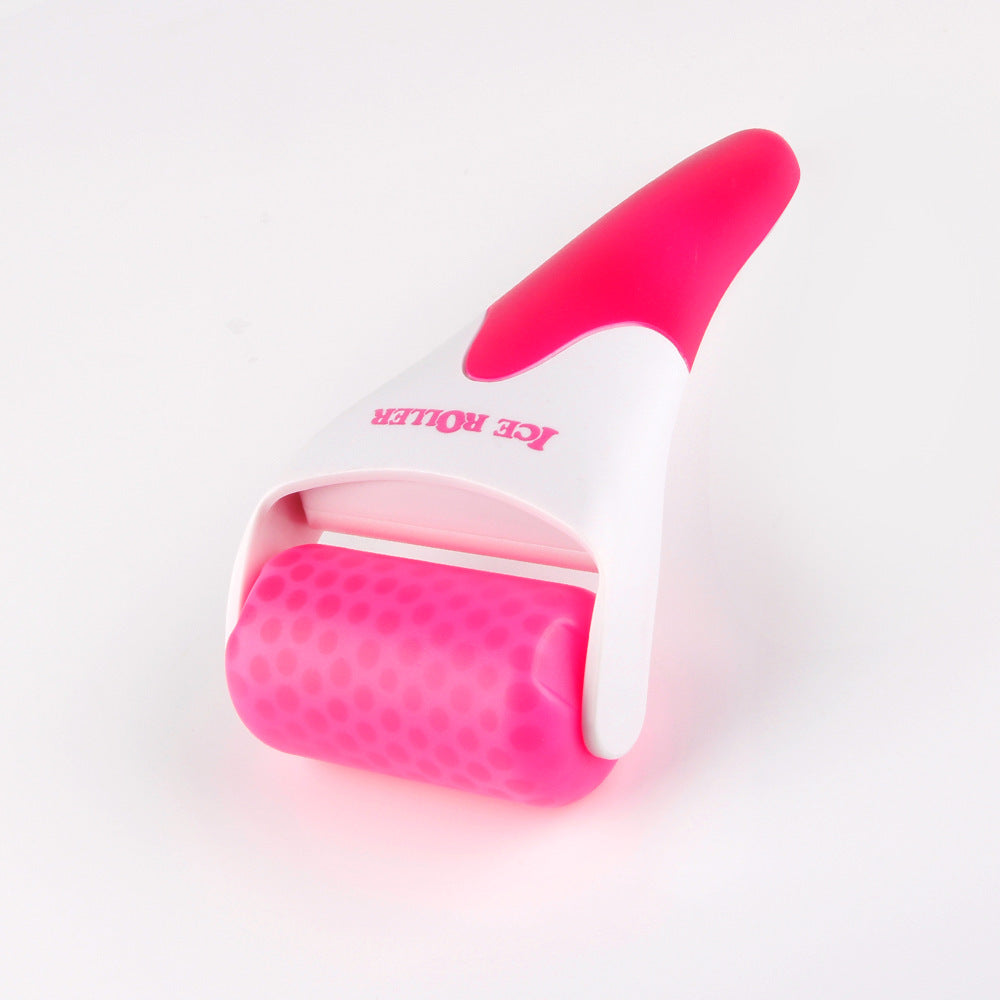 Pink and white roller with 'KE Roller' branding on a light gray background