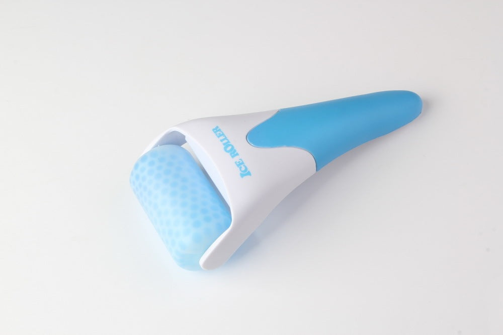 Blue and white roller device on a light gray background