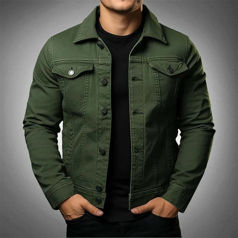 Green denim jacket worn by a person on a gray background