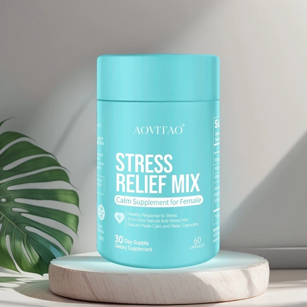 Blue container of AOVITAO Stress Relief Mix on a light surface with a plant in the background