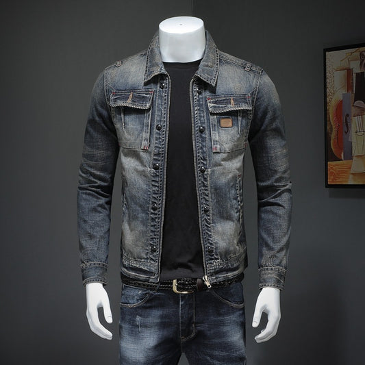 Denim jacket and jeans on a mannequin against a dark background